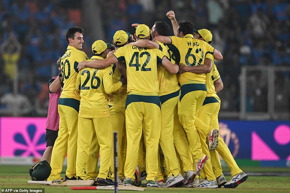 Pat Cummins' side celebrate in the middle of the Ahmedabad pitch after silencing the rowdy home crowd