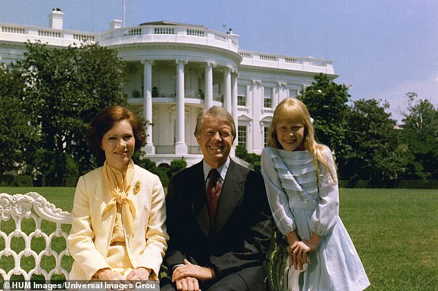 Rosalynn Carter, Jimmy Carter and Amy Carter – the youngest of the four Carter children – on the south lawn in front of the White House.  circa July 24, 1977