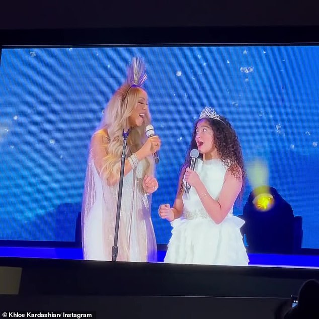 Family affair: And Mariah herself made it a family affair and brought her daughter Monroe, 12, on stage to sing