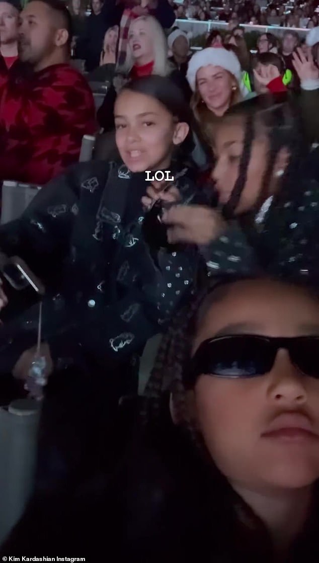 Too cool: North West at one point grabbed her mom's phone and took a few selfies