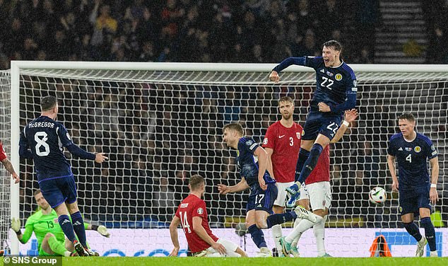 Scotland's players celebrate after Stuart Armstrong's goal gave them the lead against Norway