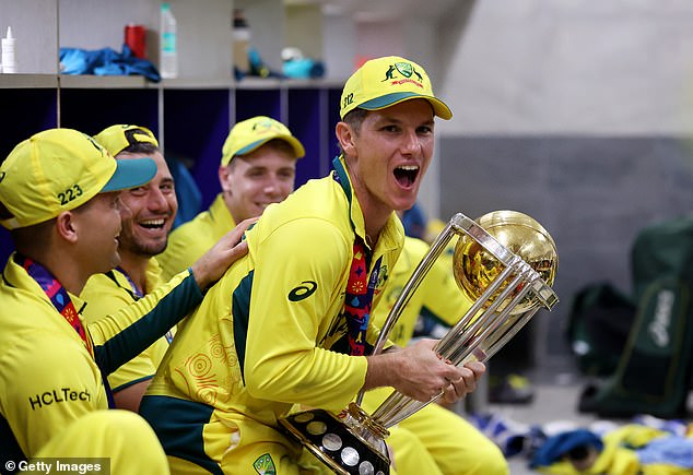 Adam Zampa (with trophy) and his co-stars did not drink a drop of beer or champagne after beating India due to an alcohol ban in the state of Gujarat, where the final was held