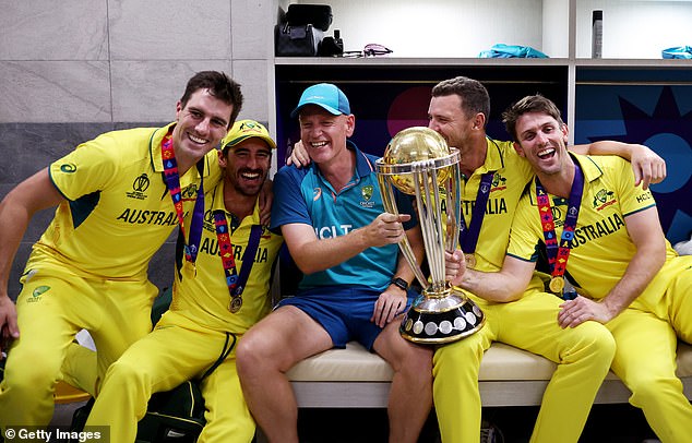 Mitchell Marsh (pictured far right) was seen enjoying a beer in his hotel room after the locker room party ended