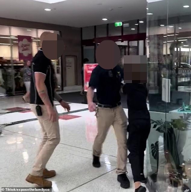 1700461658 36 Wild moment woman erupts at security as young boy is