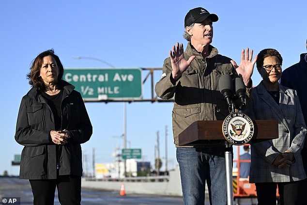 Gov. Gavin Newsom, flanked by Vice President Kamala Harris and Los Angeles Mayor Karen Bass, announces freeway reopening