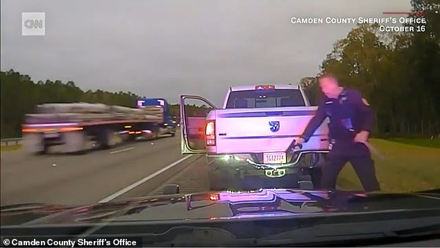 Police dashcam footage showed the argument turning violent, with the officer using his baton and two Taser strikes before ultimately shooting Cure as he fell to the ground.