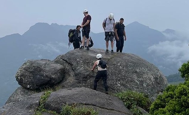 A group of hikers' trek through Tijuca National Park ended in tragedy on Sunday when their guide Leilson de Souza (above right) was killed by lightning