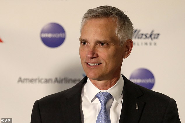 American Airlines alone earned nearly $1.4 billion in checked bags, accounting for more than 2 percent of the airline's annual revenue in 2022. Pictured, American Airlines CEO Robert Isom