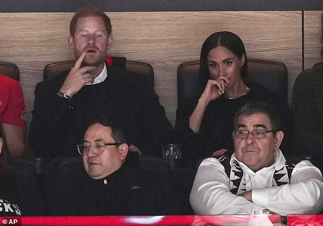 The Duke and Duchess of Sussex at their seats in the first period