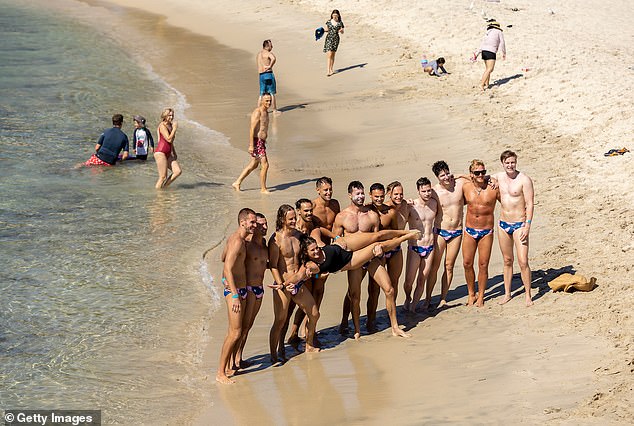 Perth is in the midst of a severe heatwave, with temperatures expected to reach 40 degrees Celsius on Thursday.  Pictured are beachgoers at Cottesloe Beach