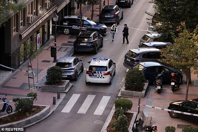 Police work at the site where Alejo Vidal-Quadras, former head of the Spanish People's Party in the Catalonia region, was shot in the face, in Madrid, Spain, on November 9