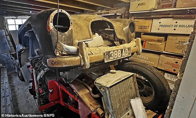 The Aston Martin was stripped to its rolling chassis and the parts put into boxes for storage ahead of a planned full restoration