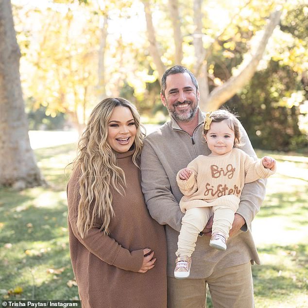 Party of four coming soon: the star announced the news in a series of adorable snaps with Moses and Malibu