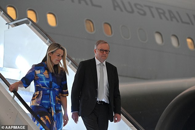 The Prime Minister has defended his government as it reaches the halfway point of its term.  Pictured with his partner Jodie Haydon arriving in Delhi for the G20 summit in India in September