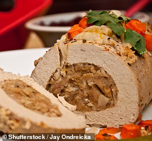 The two mixtures, the Tofurky and the filling, are combined in an industrial procedure inspired by the factory production of Nabisco's Fig Newton bars: a nested funnel within a funnel that directs the two savory goops into a tube within a tube.