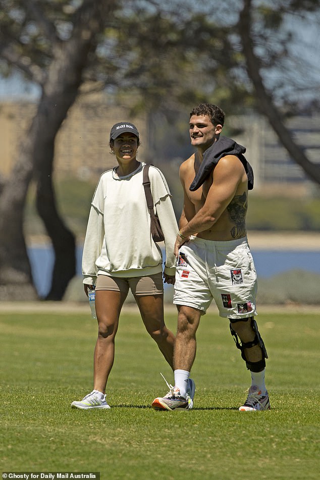 The couple delighted sports fans of all stripes when Daily Mail Australia captured exclusive photos of them sharing some tender moments in a Perth park in October