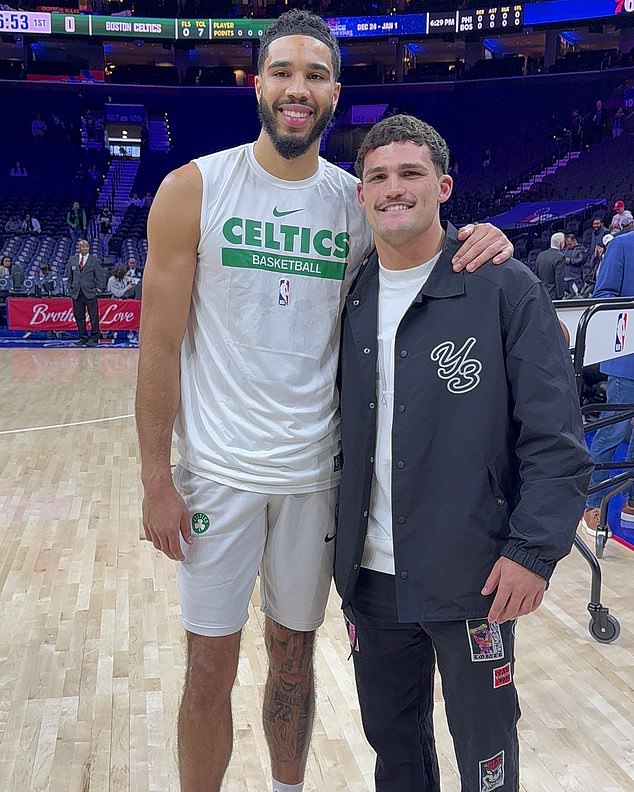 The Grand Finals hero met NBA stars including Boston's Jayson Tatum (pictured) when he attended a basketball game in Philadelphia after a party in New York