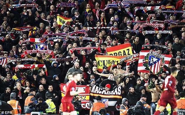 In March 2020, thousands of Atletico Madrid fans flew to Liverpool to watch their team play in the Champions League (pictured, March 11, 2020), even though lockdown rules would prevent them from watching a match in Spain.