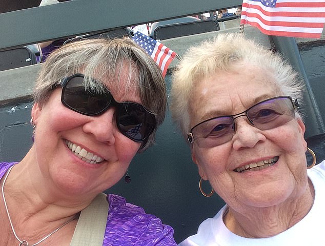 Sharon McCreary (left) with her mother Lorrie McCreary (right) at an MLB baseball game in 2017. Lorrie died after contracting Candida auris from a hospital last year