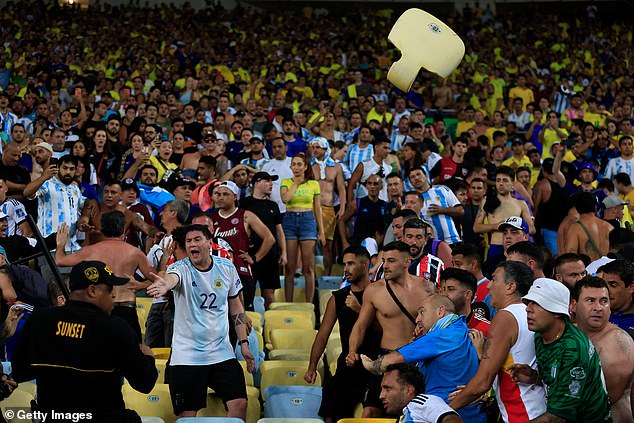 Parts of chairs flew and hit some spectators behind one of the goals