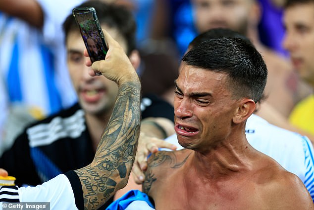 Other supporters at the Maracana were seen crying as the violence subsided