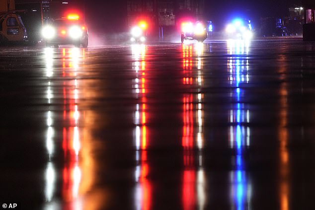 The lights of President Joe Biden's motorcade were reflected on the tarmac of Joint Base Andrews Tuesday evening as he and first lady Jill Biden fled Washington for Nantucket for the Thanksgiving holiday