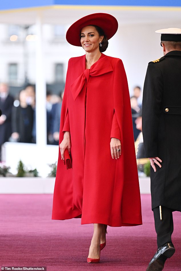 Kate opted for a chic Jane Taylor hat and £3,000 Catherine Walker red cape coat to welcome Yoon Suk Yeol and his wife Kim Keon-hee to the Horse Guards Parade