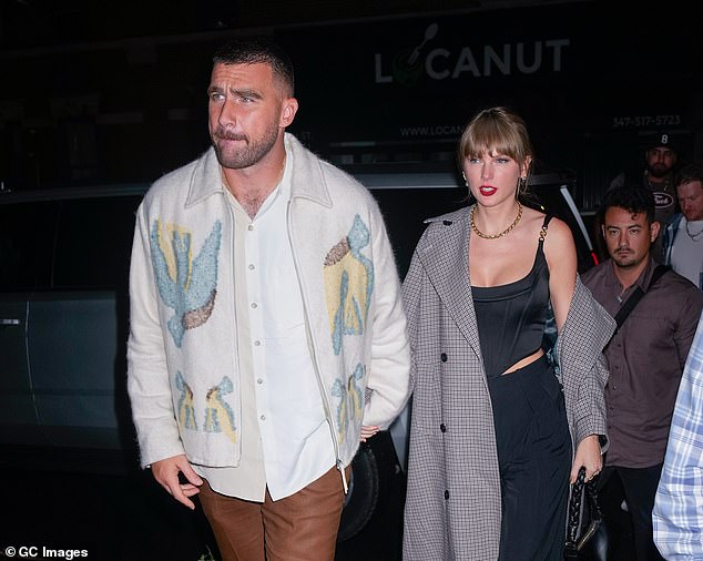 Romance: Swift and the Kansas City Chiefs tight end began their romance in late September, months after his failed attempt to give the singer his phone number during her Eras Tour concert in Missouri;  seen in October