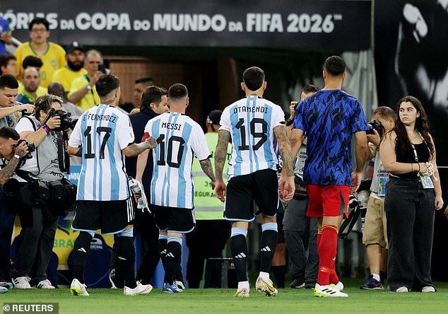 Lionel Messi and his Argentina teammates were taken back to the dressing rooms as violence delayed kick-off by around 30 minutes