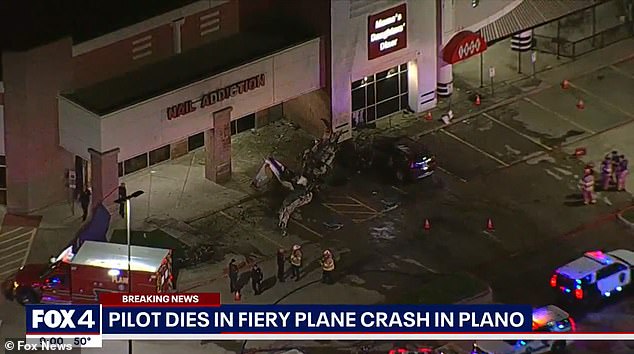 Emergency crews rushed to the crash site, less than a half mile from Air Park-Dallas Airport