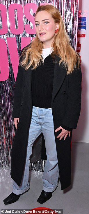 Keeping it casual: presenter Amelia Dilmodenburg wore a black quarter-zip sweater and light blue denim jeans