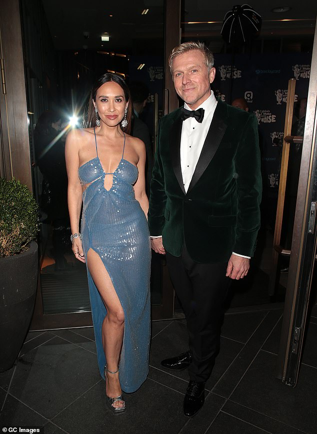 Suave: PR director Simon looked incredibly dapper in a lovely green velvet jacket and looked in love with Myleene