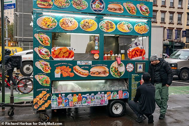 The street cart in Yorkville on Manhattan's Upper East Side serves halal food