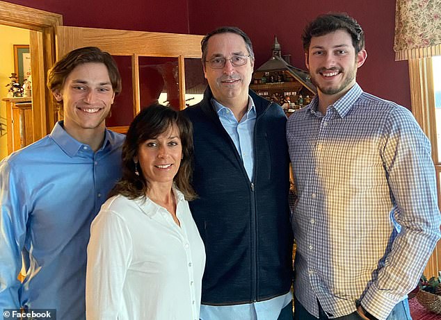 Connor Sturgeon (far right) is pictured with his parents Todd and Linda, and his younger brother Cameron, a professional model.  Minutes before the shooting, he sent his family an 