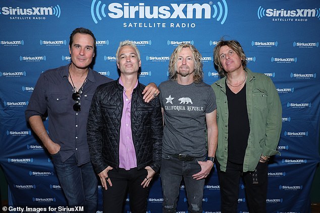 Stone Temple Pilots musicians Robert DeLeo, Jeff Gutt, Eric Kretz and Dean (far R) in 2017