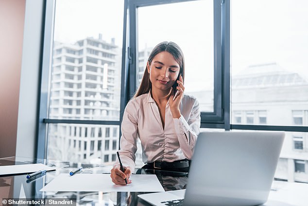 The email claimed that working in an office brings many benefits, including developing and maintaining networks, opportunities to learn and maintaining a sense of belonging (stock image of an employee working in an office)