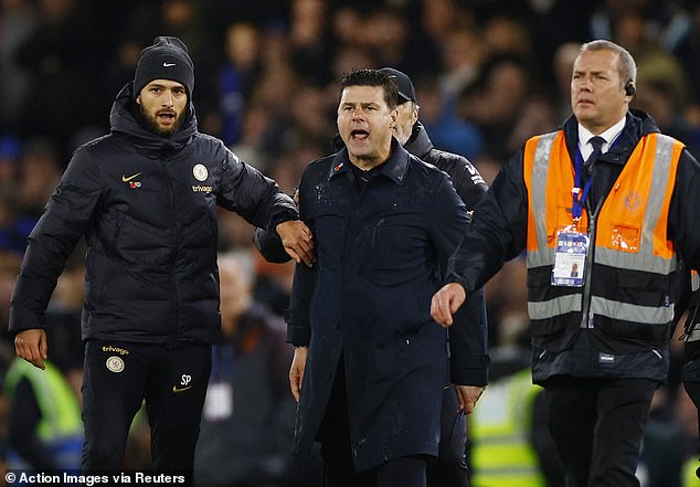 Mauricio Pochettino (centre) admitted he was wrong when he reacted angrily to the referees at the end of Chelsea's eight-goal thriller against Manchester City at Stamford Bridge earlier this month