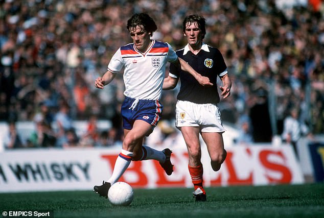A kick to the knee while playing for England against Hungary in 1981 ultimately ended his career prematurely.  Coppell is pictured getting away from Scotland's Kenny Dalglish (right)