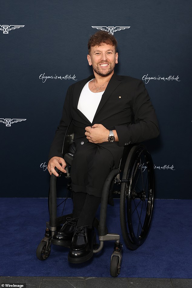 Australian tennis champion Dylan Alcott appeared in a black suit combined with a white T-shirt and black patent loafers.