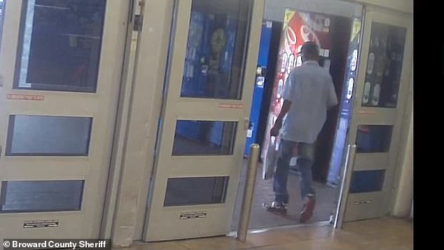 The suspect confronted the unknown victim just behind the sliding doors of the Walmart store