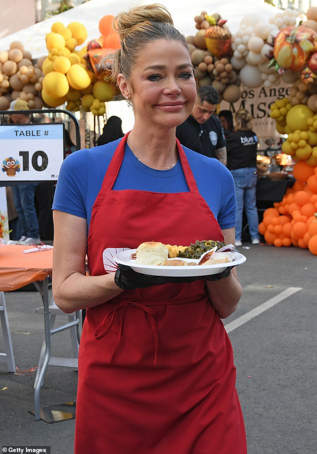 Yum: The former Bond girl, who was once married to Charlie Sheen, apparently found time to make a sign for herself too