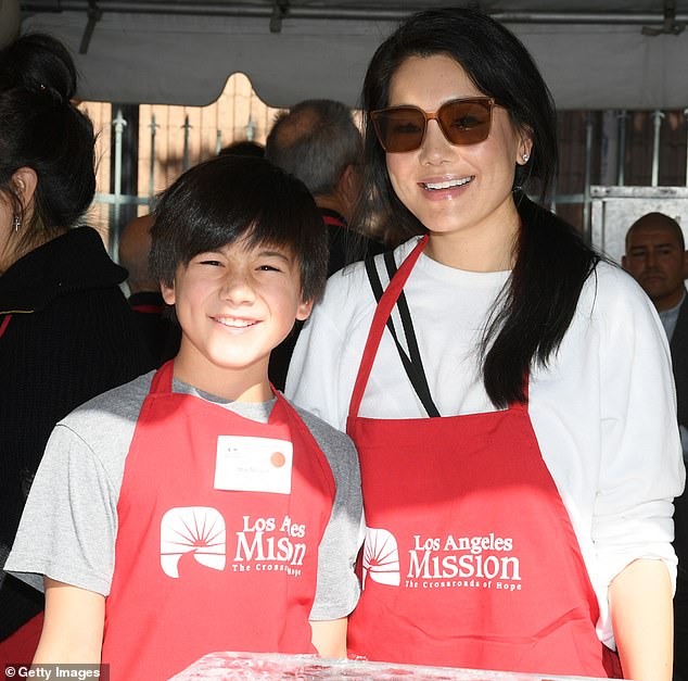 Mother and child: Crystal Kung Minkoff, who found fame as a Real Housewife of Beverly Hills, joined the festivities with her 10-year-old son Max