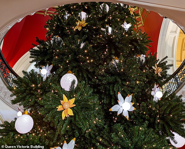 Queen Victoria Building has also taken a similarly indigenous approach, with a faux-tall Wollemi Pine decorated with baubles curated by First Nations artists