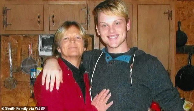 Smith, pictured with his mother Sandy, was openly gay and rumors swirled that his death may have been a hate crime, with some suggesting he had been beaten with a baseball bat.  However, this was also refuted by DuPre