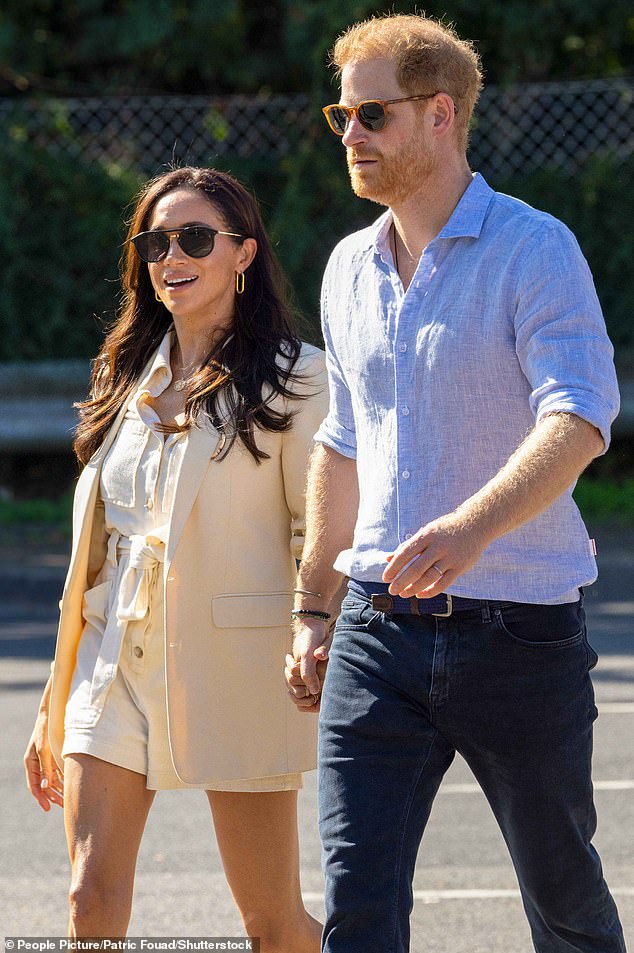 Harry and Meghan pictured at the Invictus Games in September in Dusseldorf, Germany earlier this year