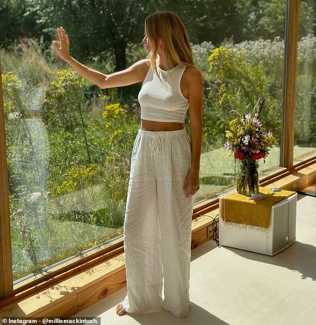 Zen: Millie was barefoot in no time, wearing a sleeveless crop top and loose linen trousers