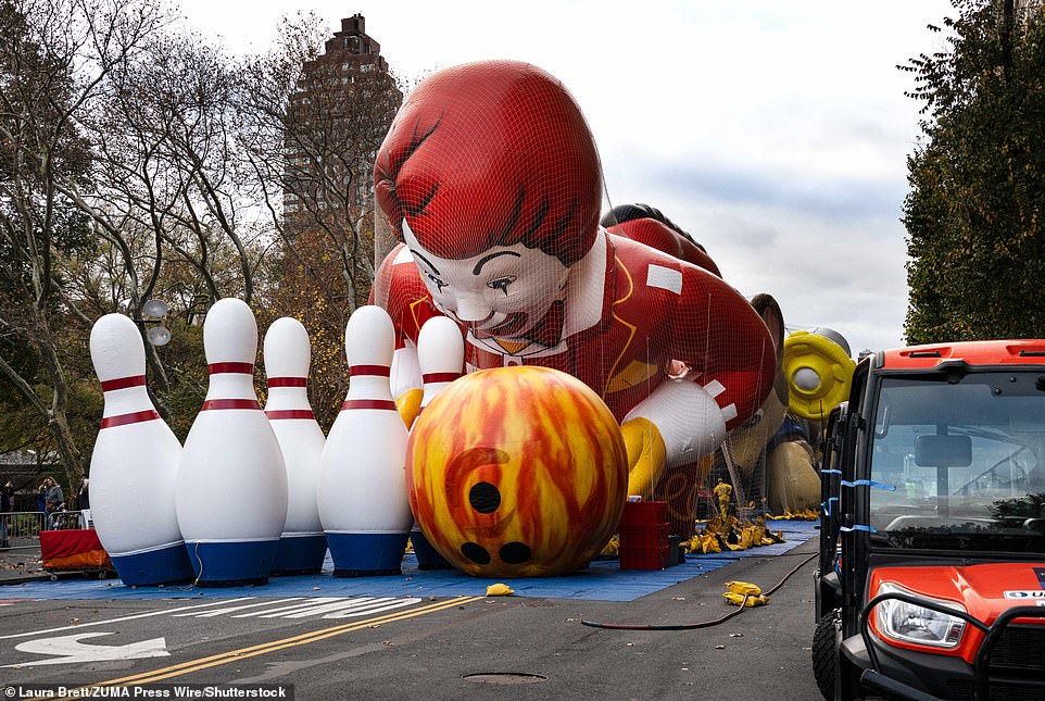 Preparations began Wednesday evening as towering balloons were set up along the parade route, seen on New York City's Upper West Side