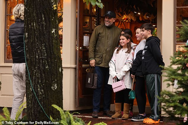 Hunter Biden poses for a photo with some young fans