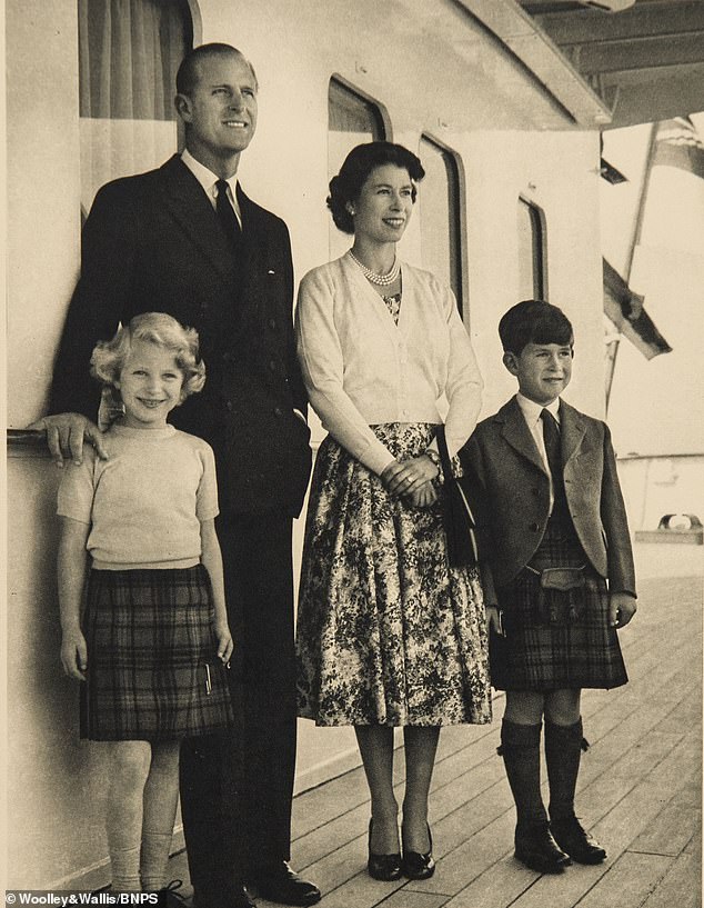 The Queen and Prince Philip with a young Anne and Charles on the 1956 Christmas card