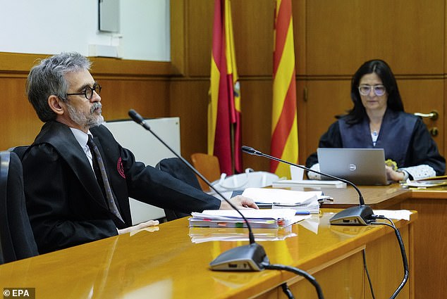 Cristobal Martell (left), lawyer for Dani Alves, attends a hearing to decide the appeal against his client's detention without bail at the Barcelona Audience Court, June 9, 2023